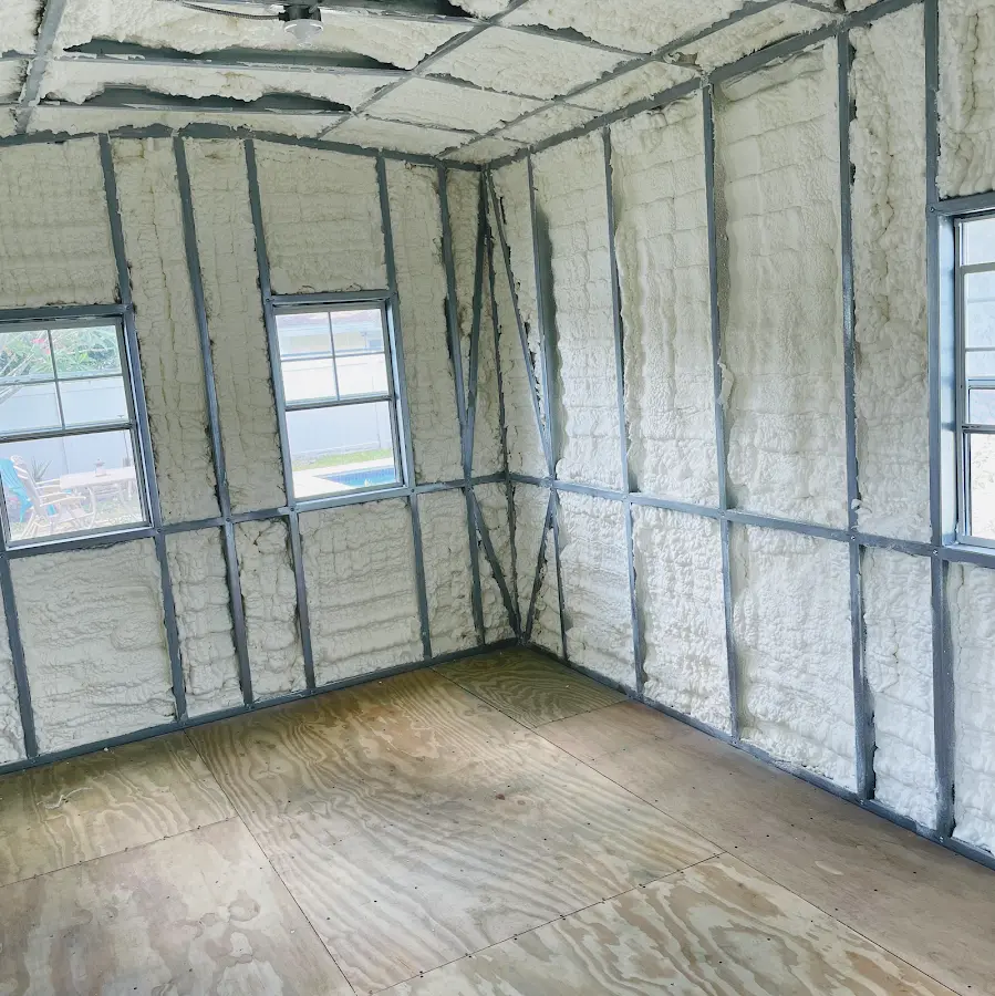 Closed-cell spray foam insulation applied to wall cavities in a residential project in South Windsor